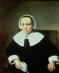 Porträt einer Dame mit weißem Kragen und Manschetten